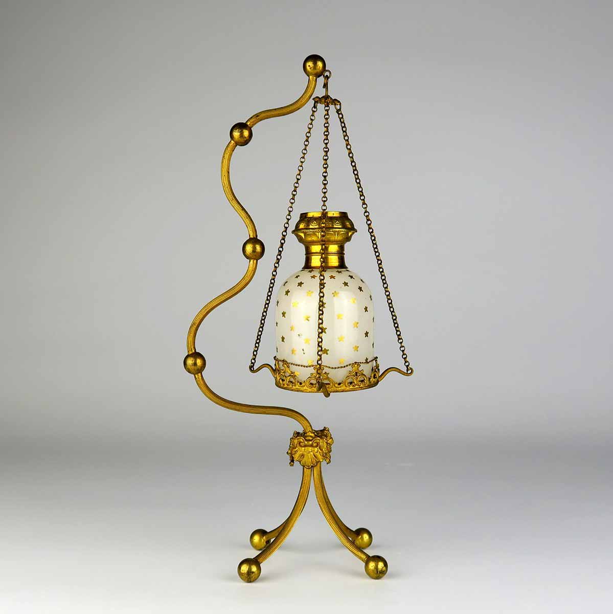 Stojánek s flakonem na parfém