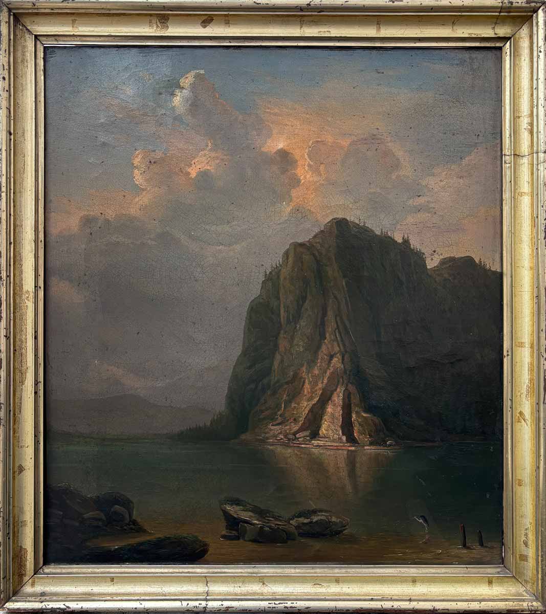 Krajina se skálou a vodní plochou